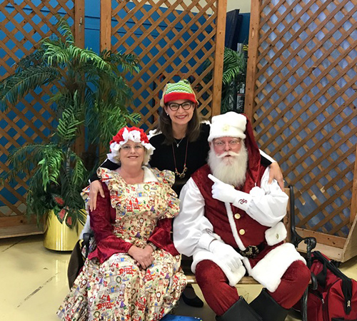 Ms. Rinaldo with Mr and Ms. Claus